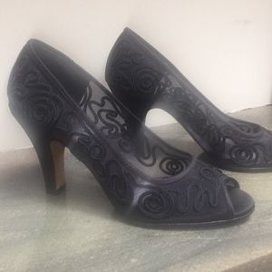Black mesh open toed pumps with brocade.